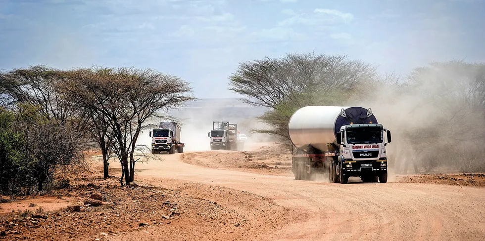 Turbine parts are driven through rural Kenya to the site of the Lake Turkana project, which is already operating.