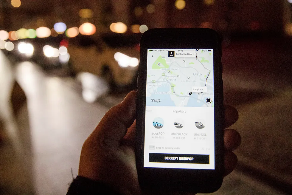 Slik så Uber-appen ut da man kunne bruke Uber Pop i Norge. Foto: Terje Pedersen/NTB scanpix