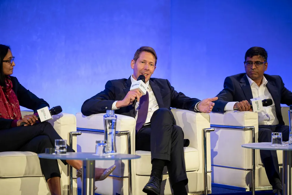 Andreas Bieringer of Masdar (centre), Sopna Surgy of RWE (left) and Ganapathy Swamy of Linde (right) at a panel during the Investing in Green Hydrogen conference in London.