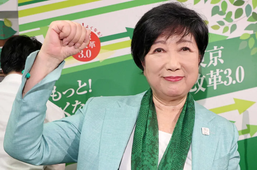 Tokyo Governor Yuriko Koike celebrating being elected to a third term in office in July this year.