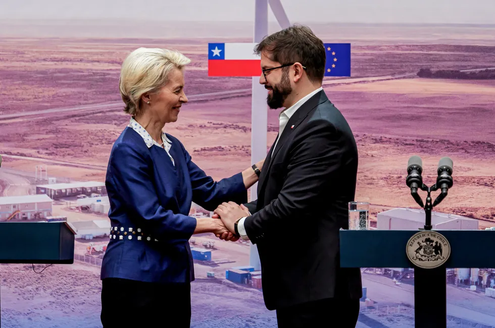 European Commission President Ursula von der Leyen shaking hands with Chilean President Gabriel Boric in Santiago yesterday.