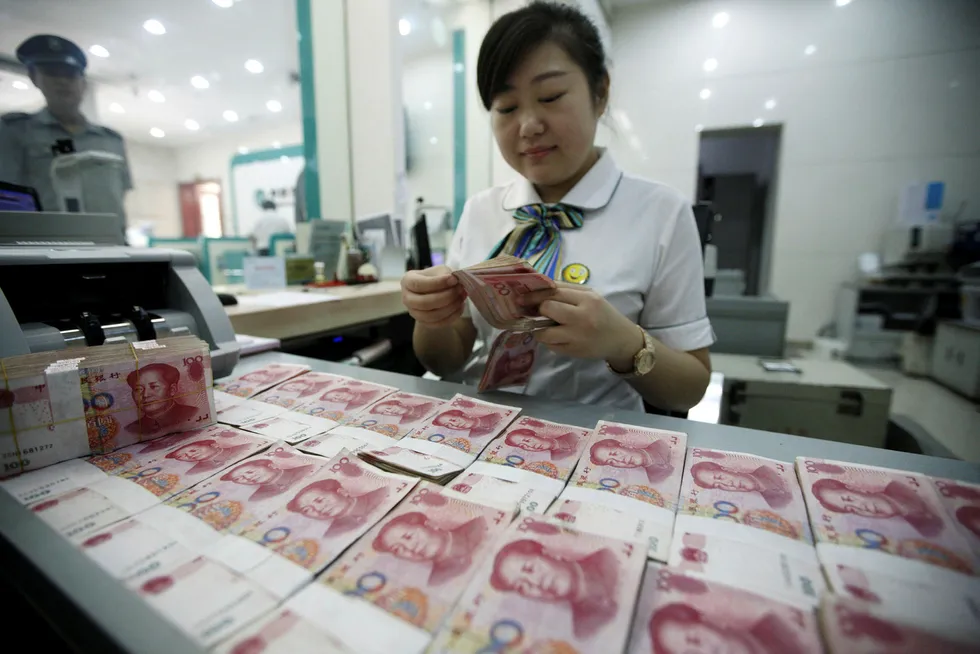 Det har vært store bevegelser på det kinesiske valutamarkedet siden nyttår. Foto: Chinatopix/AP/NTB Scanpix