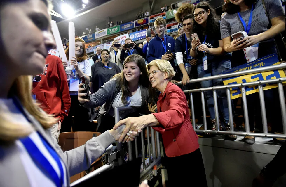 Democratic 2020 U.S. presidential candidate and U.S. Senator Elizabeth Warren (D-MA) greets supporters at the New Hampshire Democratic Party state convention in Manchester, New Hampshire, U.S. September 7, 2019. REUTERS/Gretchen Ertl ---