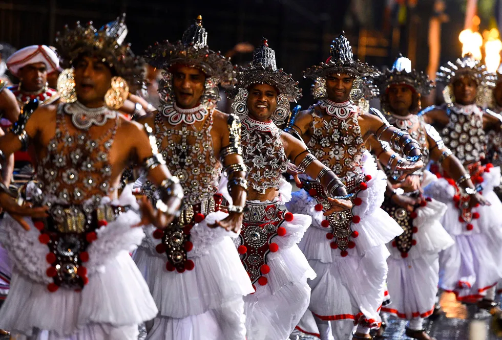Island nation: traditional dancers in the ancient hill capital of Kandy, some 116 kilometres from Colombo