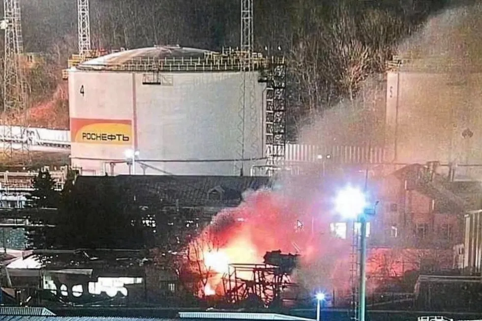 Hit and miss: A fire burns next to oil storage tanks in the city of Tuapse in Russia.