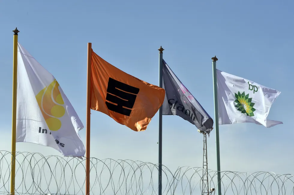 BP exit: The flags of partners in Algeria’s In Amenas gas field flutter in the breeze.