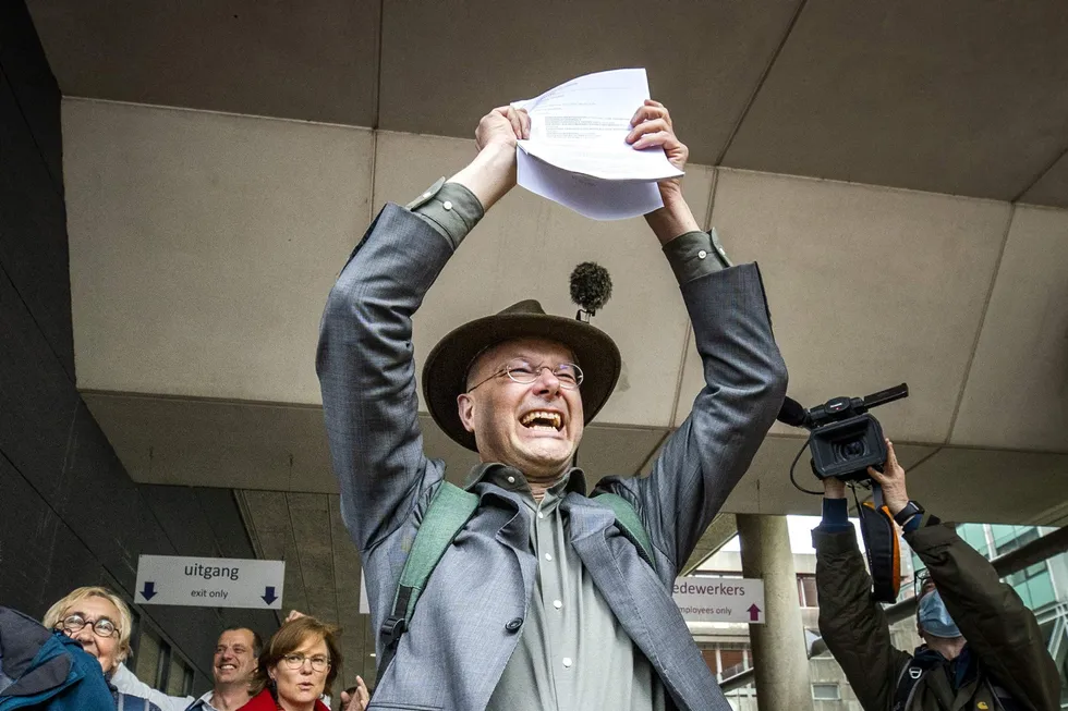 Landmark win: director of Dutch environment organisation Milieudefensie, Donald Pols, reacts as he walks outside a court in The Hague last week after the district court ruled that Anglo-Dutch multi-national Shell must reduce its emissions by 45% by 2030