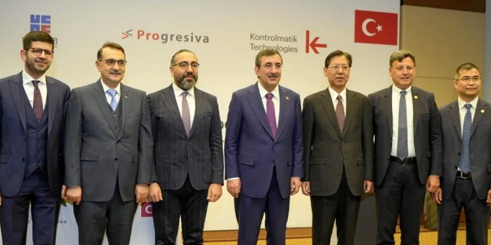 The signing ceremony in Ankara was attended by Turkey's vice president Cevdet Yılmaz (centre).