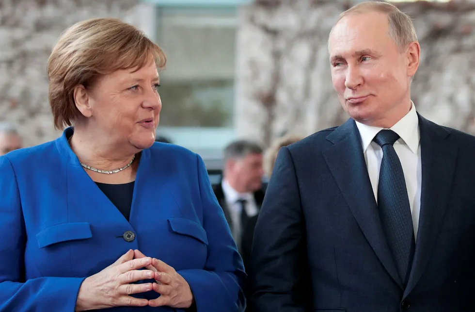 Foes or allies: German Chancellor Angela Merkel (left) and Russian President Vladimir Putin pictured during a meeting in Berlin early this year