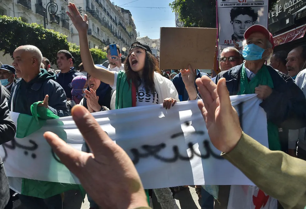 Anger: Algerian anti-government protesters take the streets of Algiers on March 26