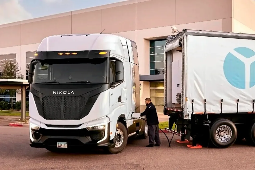 A Nikola hydrogen truck being refuelled from a mobile unit.