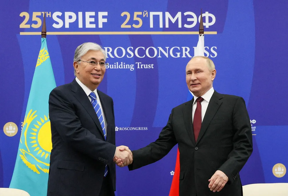 Interests: President Vladimir Putin (R) shakes hands with his Kazakh counterpart Kasym-Zhomart Tokayev during their meeting in St.Petersburg in Russia in June 2022