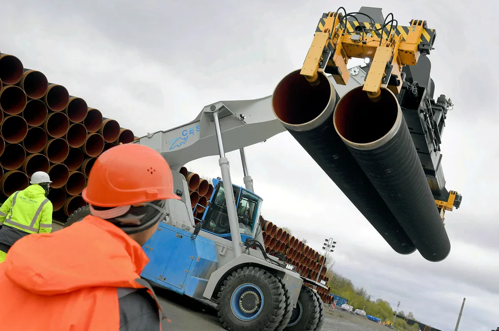 Heavy lift: Steel pipes for the North Stream 2 pipeline are uploaded in Mukran harbour in Sassnitz, Germany