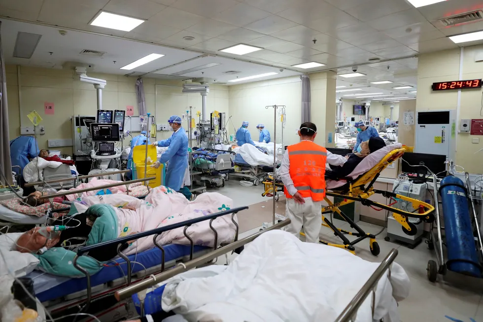 Cases increasing: medical workers attend to patients in the intensive care unit of the emergency department at Beijing Chaoyang hospital amid Covid-19 outbreak in Beijing.