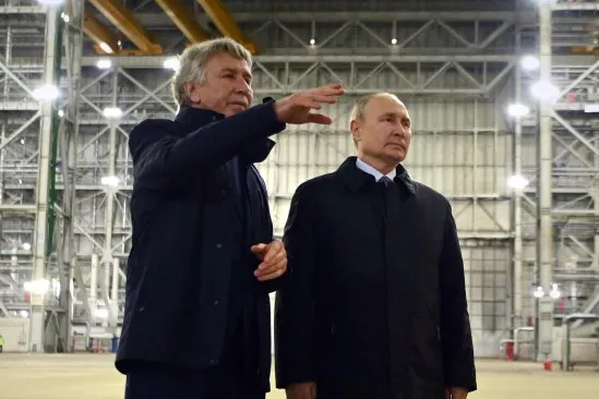 Workarounds: Russian President Vladimir Putin (right) with Novatek executive chairman Leonid Mikhelson (on his right) at the Novatek-run shipyard near Murmansk, where the Arctic LNG 2 trains are manufactured.