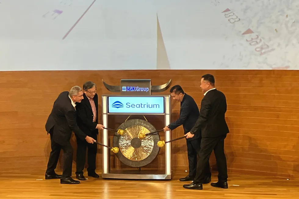 Start of trading: Seatrium chief executive Chris Ong (far right) and Seatrium chairman Mark Gainsborough (far left) strike the gong at SGX in Singapore at 9am on 27 April 2023.