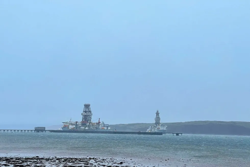 Rescue operation: the Valaris DS-4 drillship, to the right, which broke loose from its mooring at Hunterston Terminal in Ayrshire on Tuesday