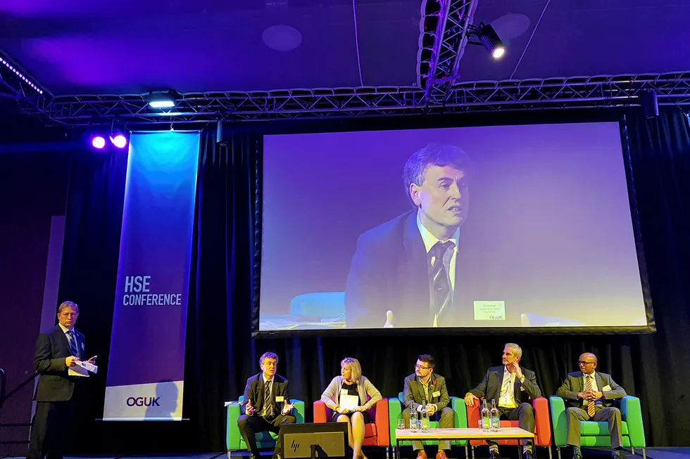 Warnings: HSE Energy Division head Chris Flint (far left seated), Wendy Kennedy, chief executive at the Offshore Petroleum Regulator for Environment & Decommissioning (Opred) (second left) and Steve Rae, executive director of Step Change in Safety (second right) speaking at OGUK's 2018 health, safety and environment conference in Aberdeen