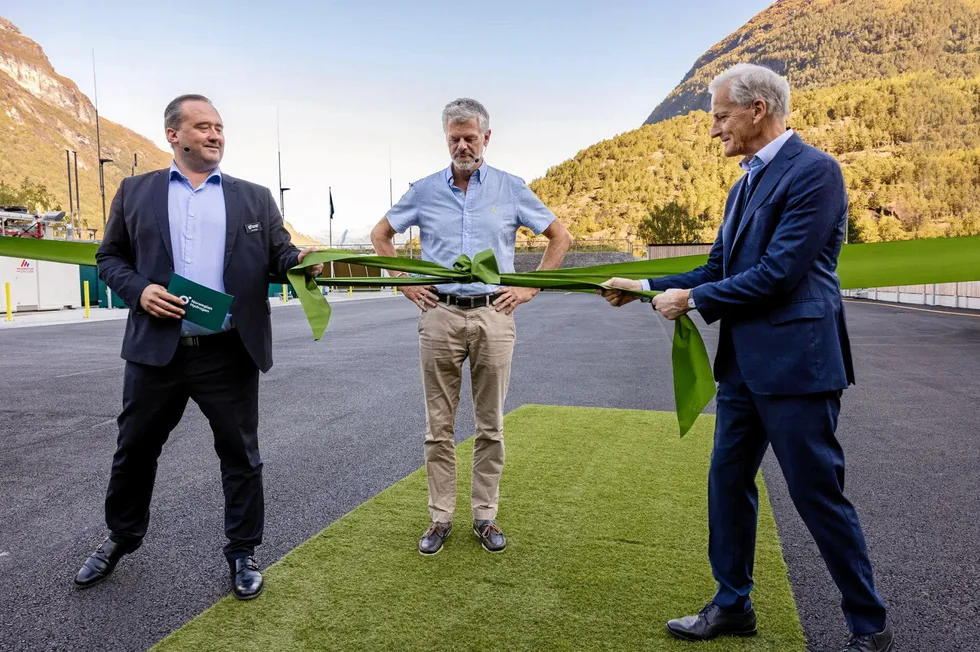 (l-r) Norwegian Hydrogen CEO Jens Berge, chairman Knut Flakk and Prime Minister Jonas Gahr Støre conducting the official ribbon opening of Hellesylt Hydrogen Hub in September.