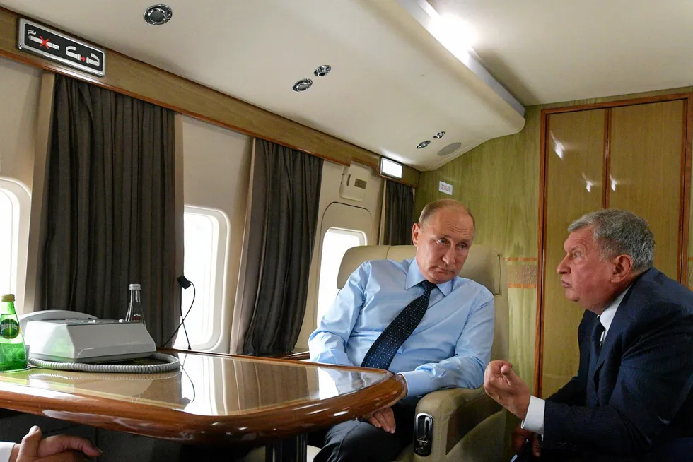 Power struggle: Russian President Vladimir Putin (left) and Rosneft chairman Igor Sechin