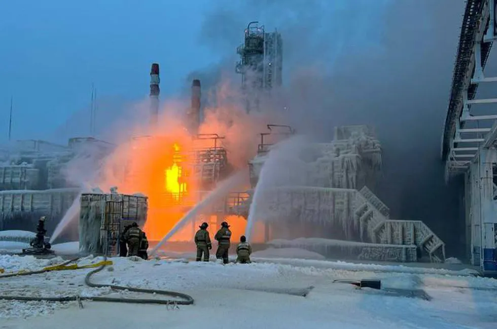 Chilly battle: Firefighters battle with a fire following an explosion at the Novatek-operated gas condensate processing facilities near the Russian port of Ust-Luga in the morning of 21 January 2024.