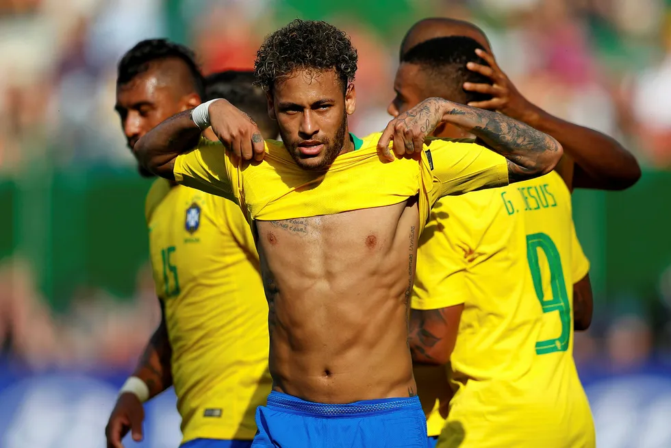 Brasils stjernespiss Neymar feirer Brasils andre mål i en vennskapskamp mot Østerrike i Wien 10. juni i år. Foto: Leonhard Foeger/Reuters/NTB Scanpix