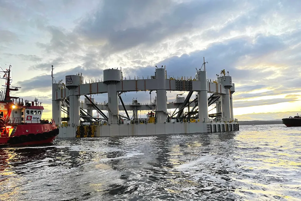 The first sea cage in Arctic Offshore Farming is being launched at the Fellesholmen site.