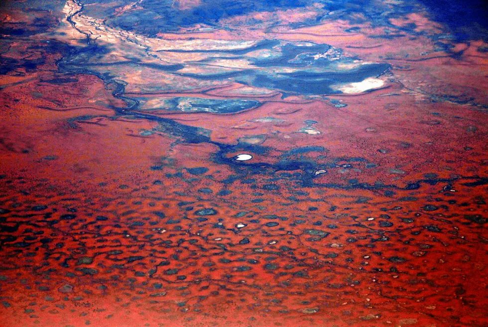 Red centre: a small lake among sand dunes in the Tanami Desert in Australia's Northern Territory