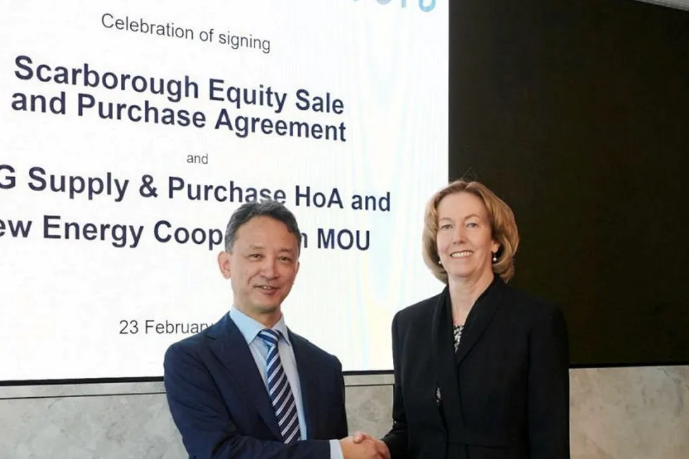 Recent highlight: Woodside chief executive Meg O'Neill and JERA Global chief executive Yukio Kani at the Scarborough signing ceremony