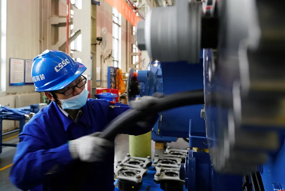 A worker at a Chinese wind turbine factory.