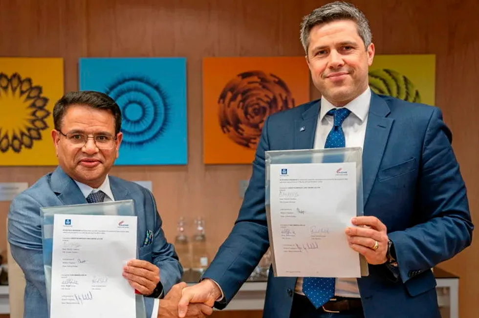 Manoj Upadhyay, ACME chairman and managing director (left) and Magnus Ankarstrand, president of Yara Clean Ammonia (right) hold the signed agreement.