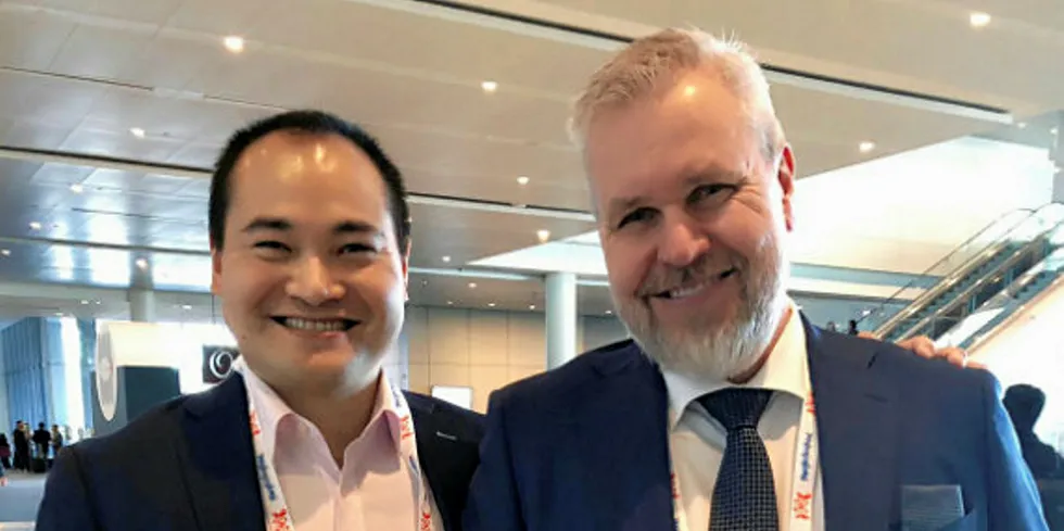 CEO Roy Hoias (right) and CFA Managing Director Howard Tang (left).