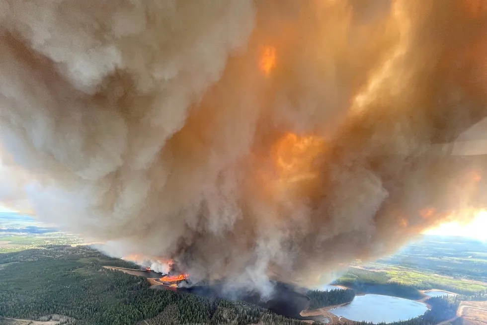 Hot zone: smoke rises from a wildfire near Lodgepole in Alberta, Canada.