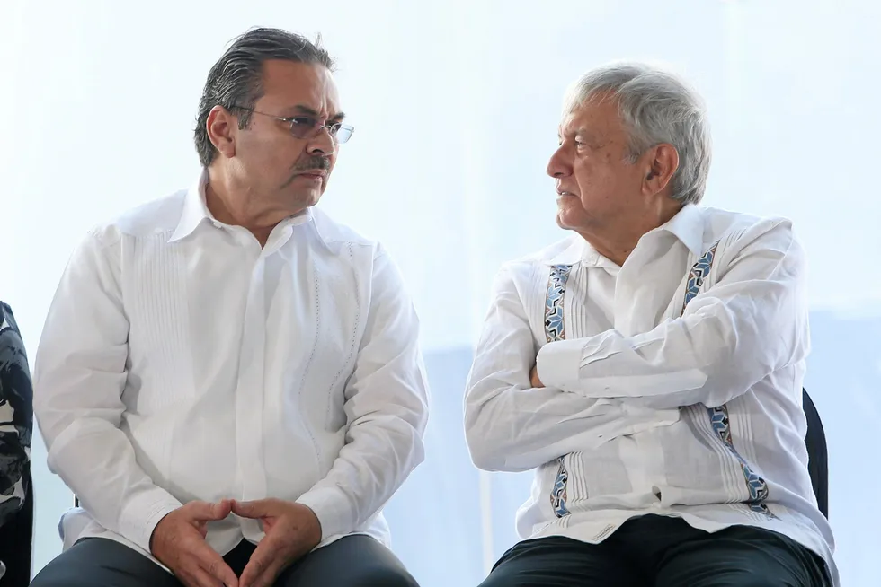 Duo: Pemex chief executive Octavio Romero Oropeza (left) and Mexican President Andres Manuel Lopez Obrador