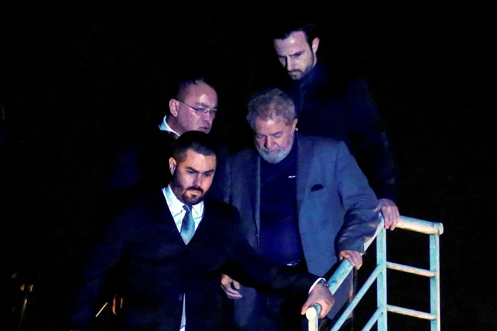 Watershed moment: Brazilian ex-president Luiz Inacio Lula da Silva arrives at Federal Police headquarters in Curitiba where he is due to serve a 12-year prison sentence