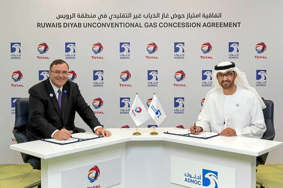 Chief executives Patrick Pouyanne of Total and Adnoc's Sultan al-Jaber at the signing ceremony for the Ruwais Diyab concession in Abu Dhabi in 2018