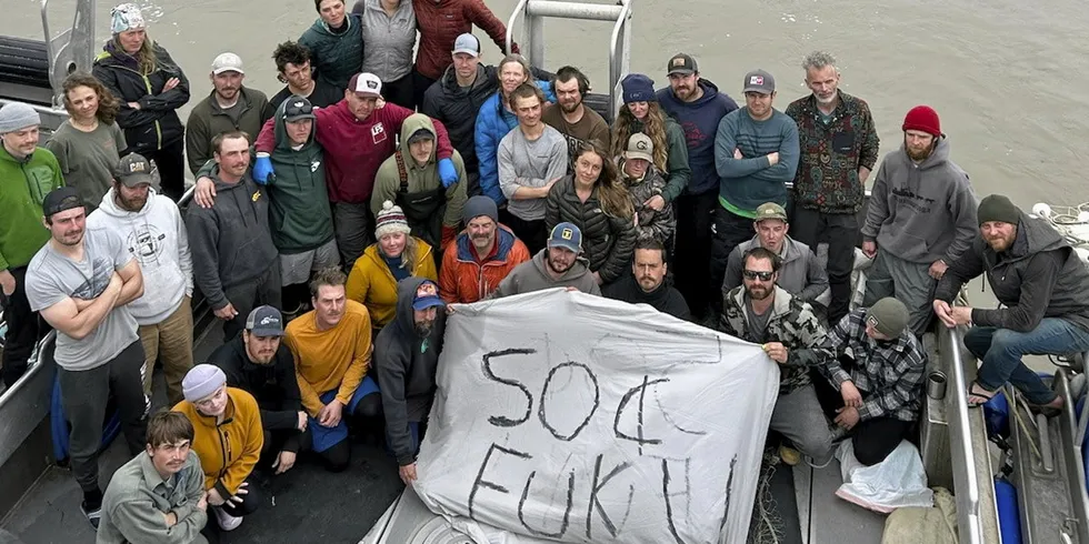 A Bristol Bay radio group protests low prices offered by processors in the Naknek River on July 20, 2023.