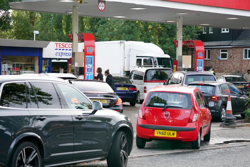 Crisis: drivers queue for fuel at a petrol station in Birmingham, in the UK. Long lines of vehicles have formed at many gas stations around the UK since Friday, causing spillover traffic jams on busy roads