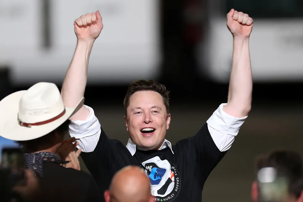 Celebration: SpaceX founder Elon Musk celebrates after the successful launch of the SpaceX Falcon 9 rocket