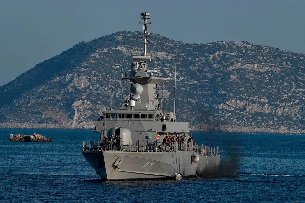 Tensions: a Greek naval vessel patrols waters off the Greek islet of Kastellorizo - two kilometres from Turkey's coast - this summer