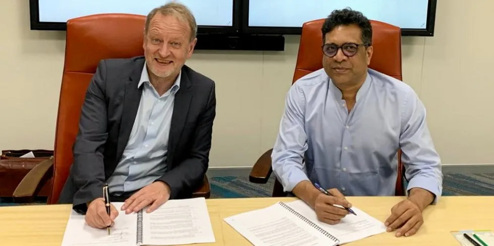 John Cockerill CEO Jean-Luc Marangue and Greenko boss Anil Chalamalasetty sign their partnership deal in Hyderabad, India.
