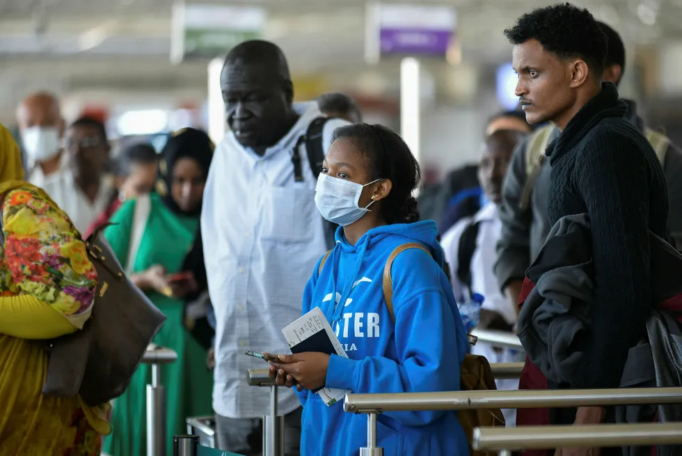 Africa at risk: a passenger wears a mask as she waits at passport control in Bole International Airport in Addis Ababa, Ethiopia