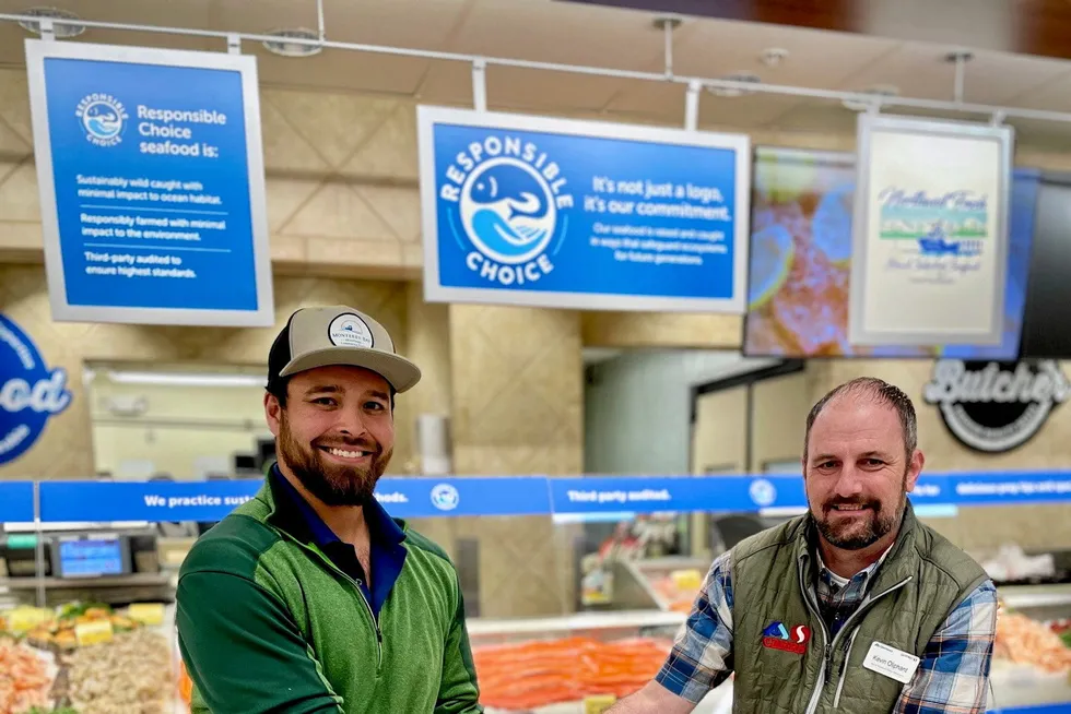 Lusamerica staffer Peter Adame last year handed off Copper River sockeye salmon to Safeway’s Meat and Sales Manager Kevin Oliphant at their Bellevue location.