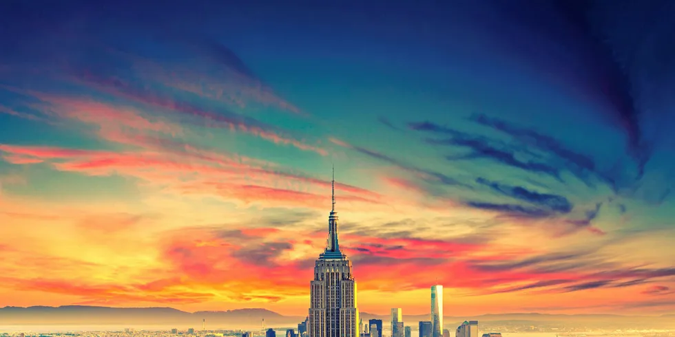 A view of Manhattan and beyond, featuring the Empire State Building and the new One World Trade Center