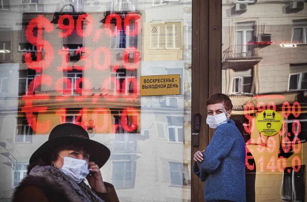 Shaky: People walk past a currency exchange office in central Moscow at the end of February 2022