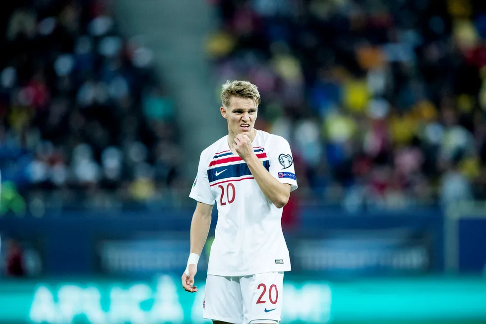 Martin Ødegaard er for tiden av Norges mest kjente fotballspillere i utlandet. Her ikledd den norske drakten, under EM-kvalifisering mot Romania.