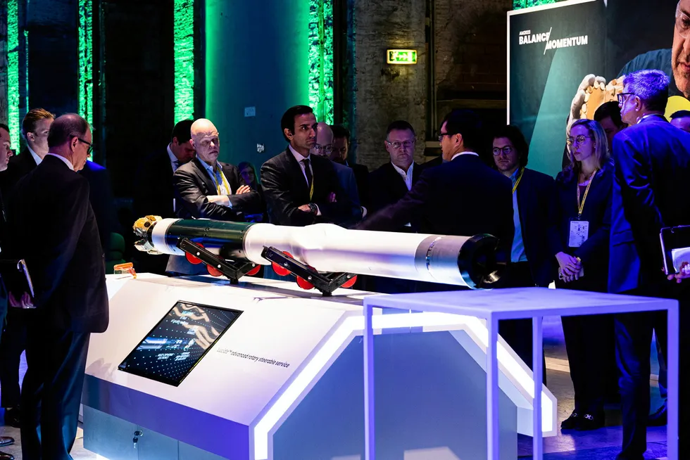On display: Visitors attend a technology exhibition at Baker Hughes' 2023 annual meeting in Florence, Italy.