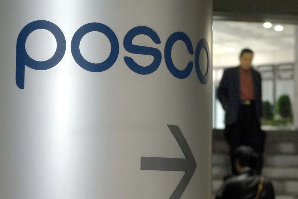 Parent: Posco's logo in front of the company's headquarters in Seoul, South Korea