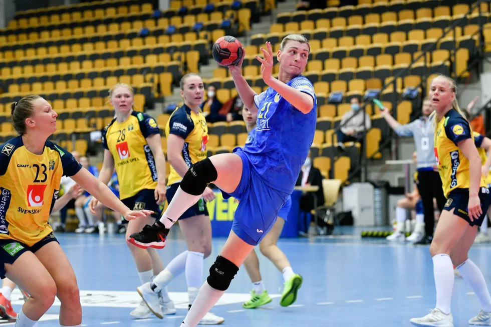Eyes on the prize: Ukraine's Iryna Stelmach scores against Sweden during their World Cup handball qualifier second match in the Sparbanken Skane Arena in Lund, Sweden, earlier in April