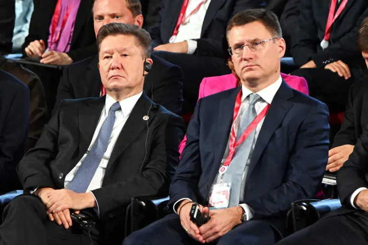 Multitasking: Russia's Gazprom executive board chairman Alexei Miller (left) and deputy prime minister in charge for energy issues Alexander Novak (right).